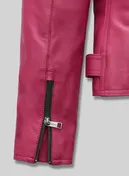 Close-up of zipped sleeve cuff on a pink leather biker jacket