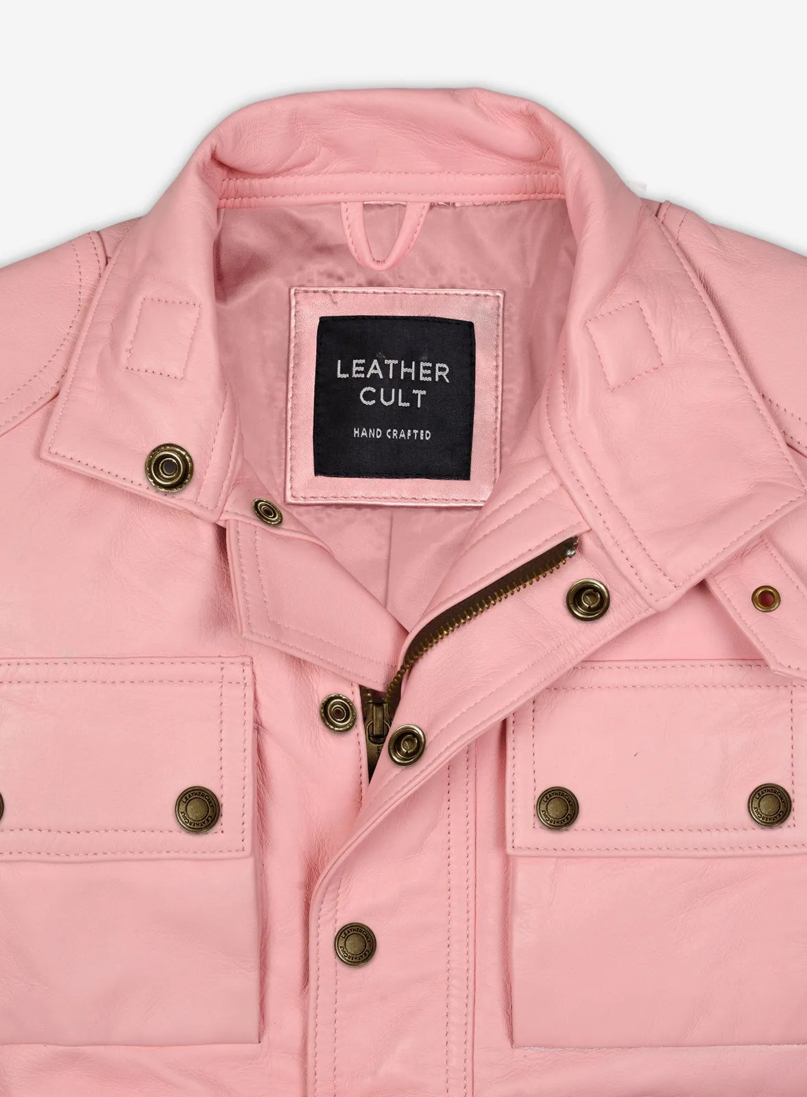 Close-up of light pink leather jacket collar, zipper, snaps and flap pockets