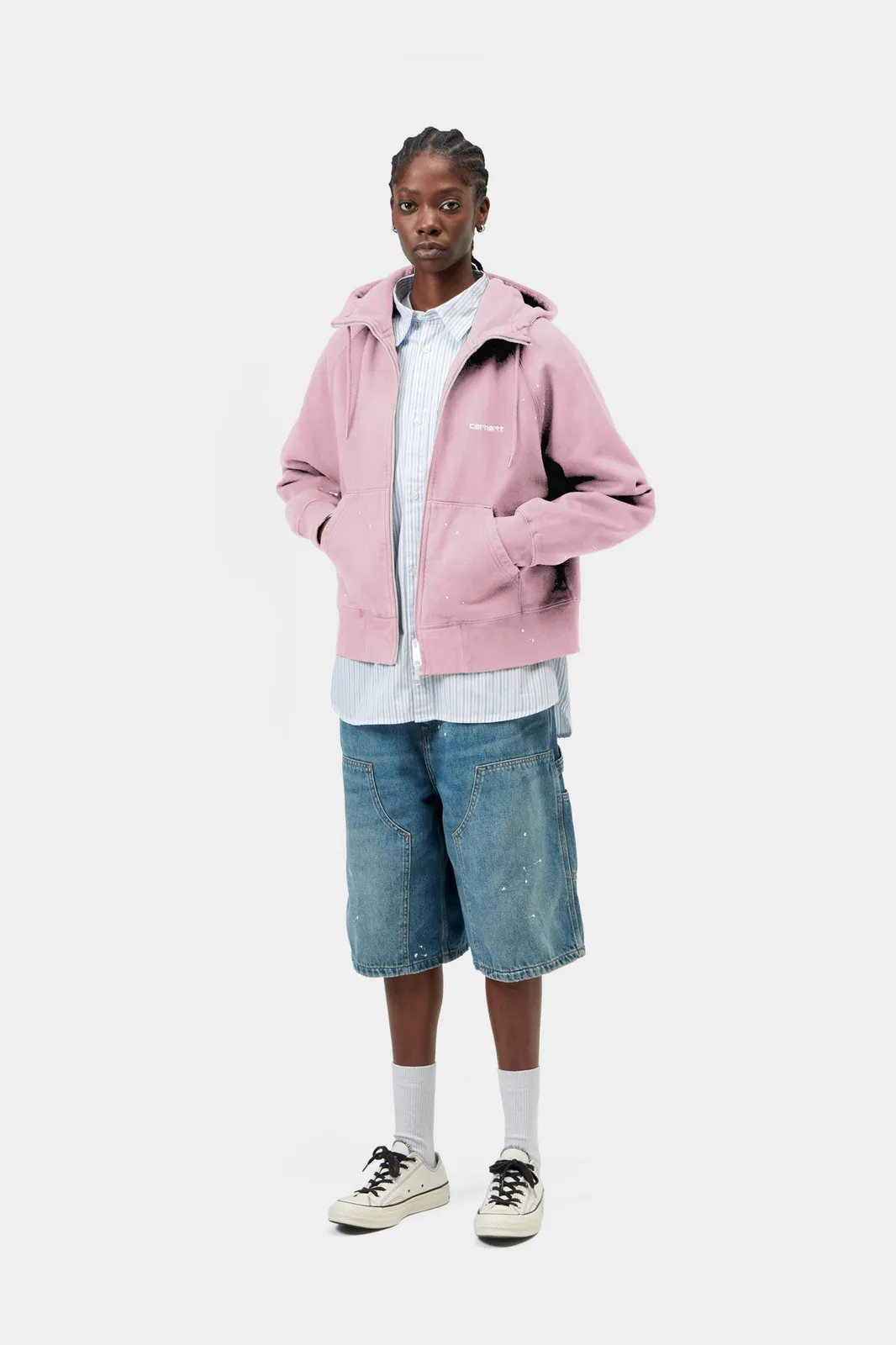 Model wears Women's Hooded Painter Jacket in purple|pink