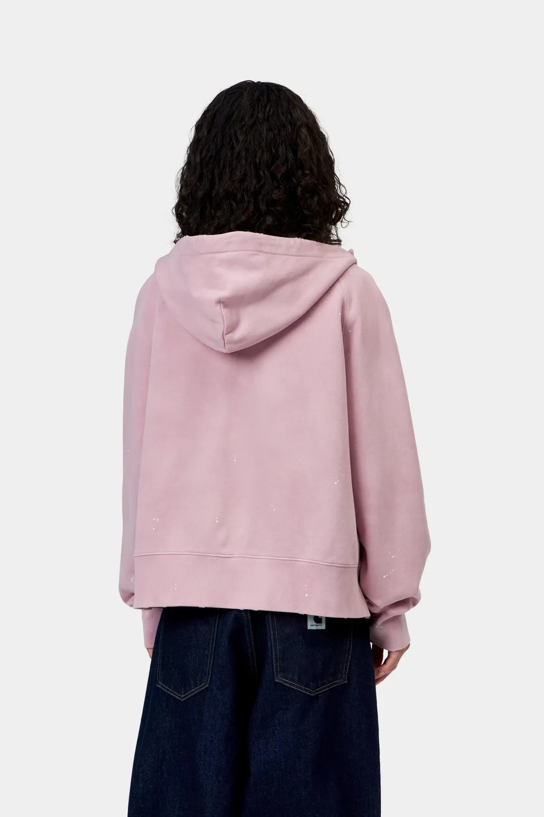 Model wears Women's Hooded Painter Jacket in purple|pink
