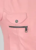 Close-up of flap pocket with snap and zip pocket on a pink leather jacket
