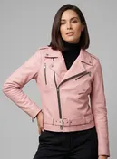 Woman wearing a light pink leather biker jacket with belted waist